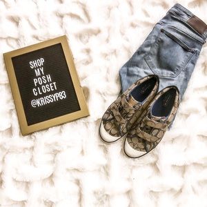 coach signature sneakers with Velcro closure.